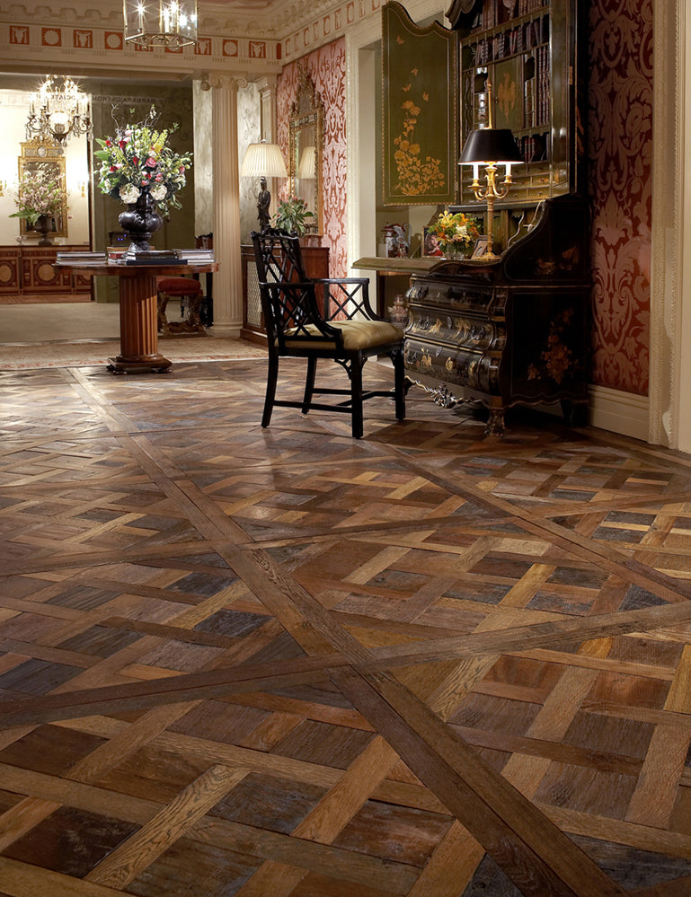 Versailles parquet flooring, is a feeling of sophistication and  craftsmanship. This exquisite flooring style, often composed of  interlock